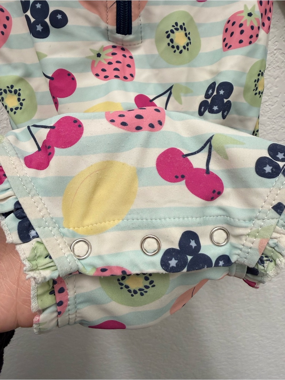 Ruffle Butts Navy-Trim Fruit Print Long Sleeve One-Piece - Picture 6 of 7
